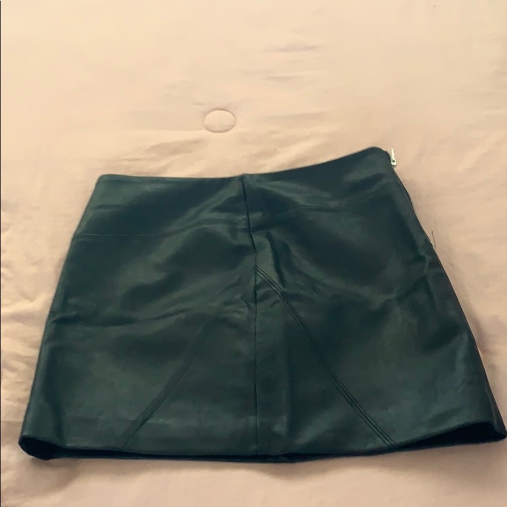 Black leather mini skirt